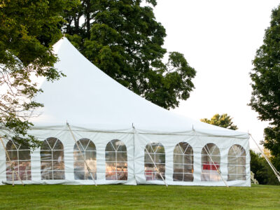 A,White,Wedding,Tent,Set,Up,In,A,Lawn,Surrounded
