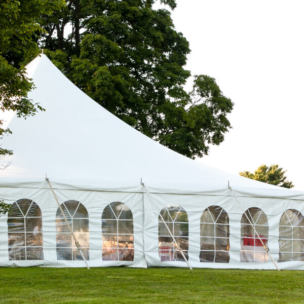 A,White,Wedding,Tent,Set,Up,In,A,Lawn,Surrounded