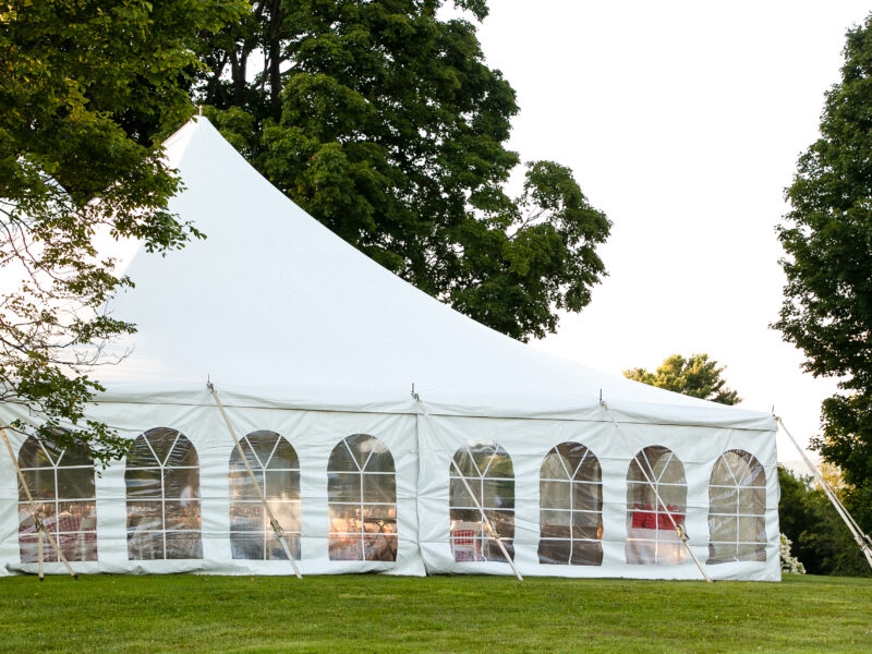 A,White,Wedding,Tent,Set,Up,In,A,Lawn,Surrounded