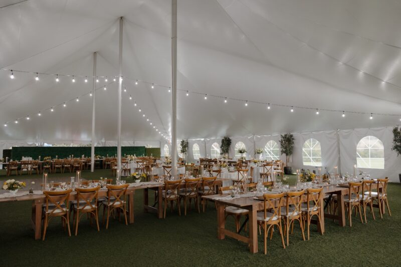 Elegant,Wedding,Reception,Setup,Inside,A,Large,White,Tent,With